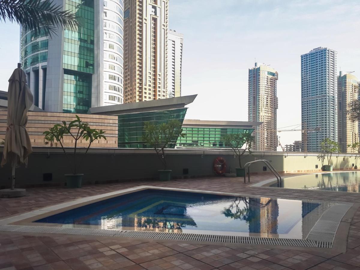شقة Higuests - Cozy Studio With Panoramic Views On The Lake دبي المظهر الخارجي الصورة
